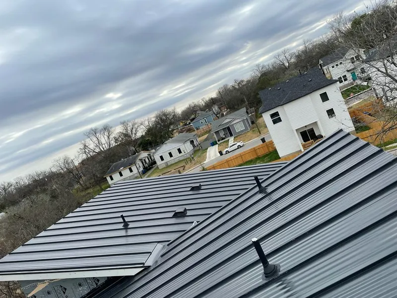 Standing seam metal roof panels with vents for Skylight Repair in Tinley Park